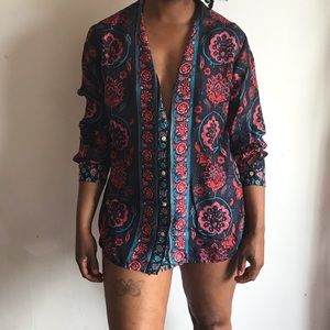 100% silk button down collar blouse.  Size Lrg